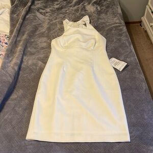 Halter white midi dress with ruffle details